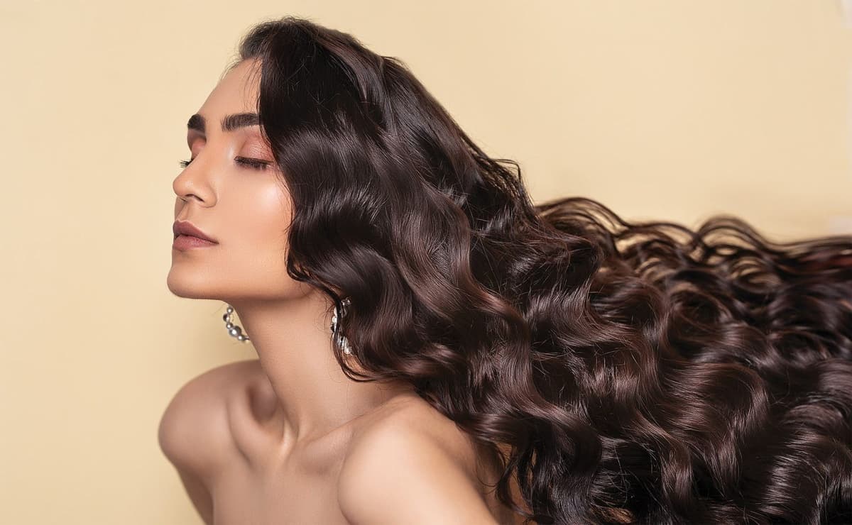 Client with long styled hair at Margie Salon